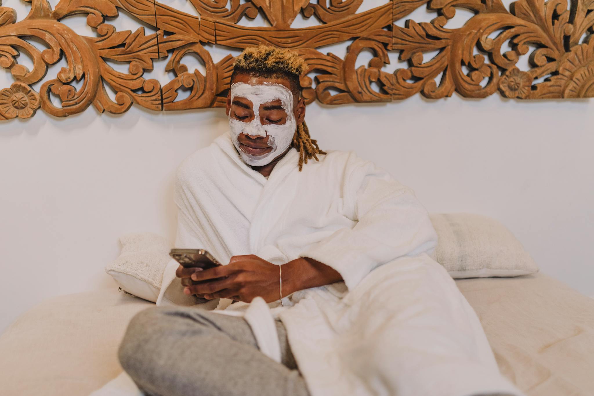 Contact 4 A client receiving a relaxing skin care treatment at our Silky Skin Accra Center.
